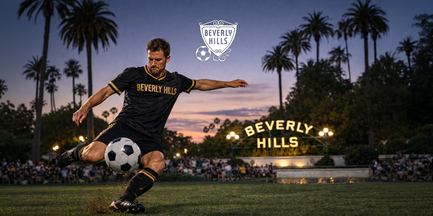 Person playing soccer with 'Beverly Hills' sign in the background